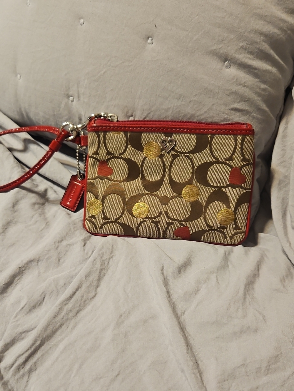 Coach Canvas Wristlet with Red Trim and Gold Accents